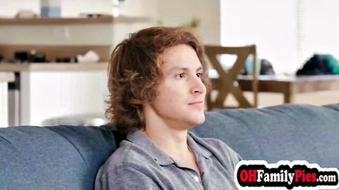 Jessie Saint's stepbro lounging on couch in teasing family scene