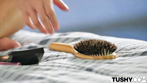 Lana Sharapova teasing with hairbrush in Tushy bedroom scene