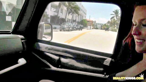 Jada Stevens smiling in Jeep on sunny outdoor drive, Reality Kings