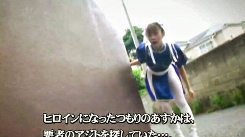 Shocked Asian babe in tight blue sailor schoolgirl uniform pressed against outdoor wall