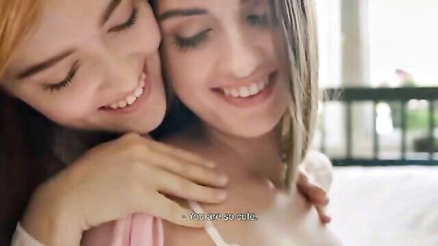 Jia Lissa and Lena Reif in intimate lesbian embrace, smiling seductively