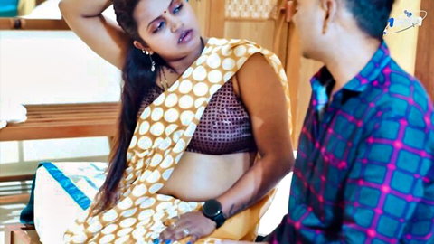 Sexy Indian MILF in yellow polka dot saree blouse exposes belly seducing husband