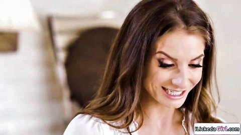 Silvia Saige smiles seductively in white blouse, teasing vibe