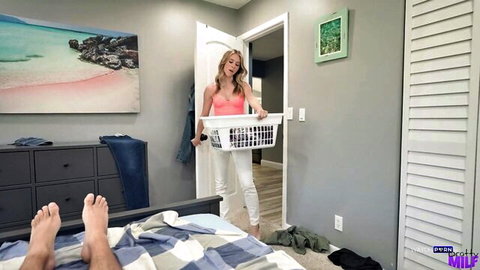 Anya Olsen as busty stepmom holding laundry basket near naked stepson