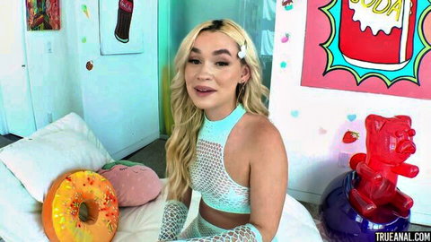 Blonde with small tits in sexy mesh lingerie posing playfully
