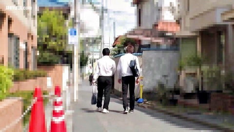 Two Japanese businessmen walking down street in JAV thumbnail for friend's horny mom patient