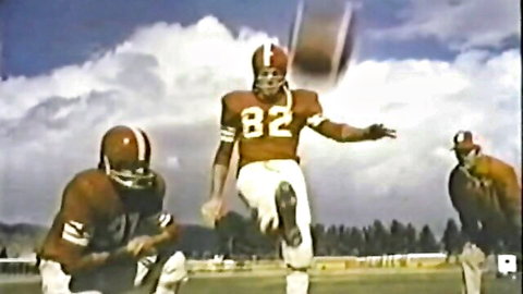 Vintage football players in action on the field, athletic kick scene