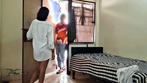 Desi college girl in white shirt and jeans teases at doorway with delivery boy