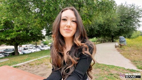 Sage Hunter smiling in black top outdoors, POV RealTeens Bang video