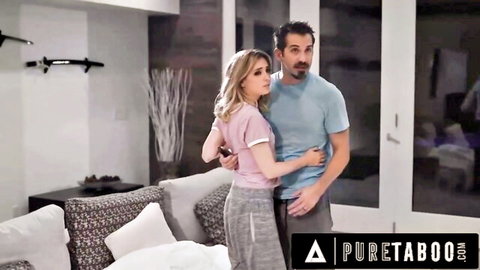 Mature man grabs young blonde from behind in tight pink top and grey pants taboo embrace