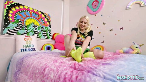 Blonde MILF pulls neon green thong aside exposing shaved pussy with socked feet up in kawaii room