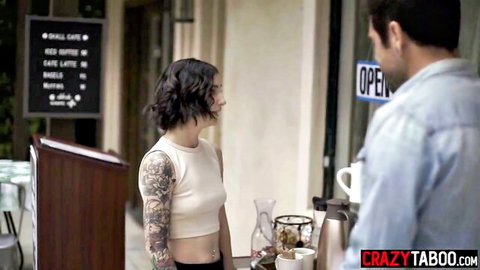 Tattooed waitress Stevie Moon chats with customer in steamy diner tease