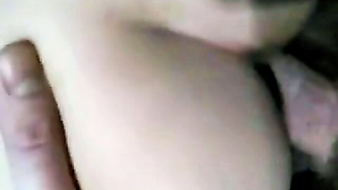 Blonde woman gagging hard on thick fingers deep in her throat with saliva drooling out