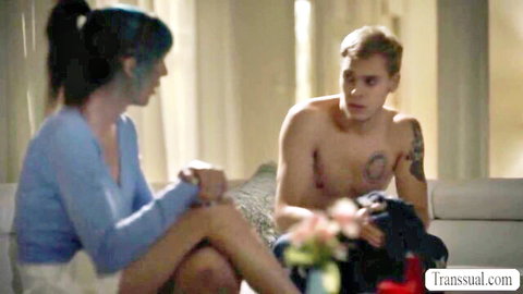 Melanie Brooks TS stepmom chats with shirtless stepson on couch