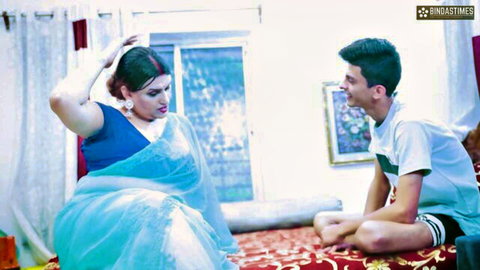 Indian stepmom in blue saree with young stepson on bed, desi taboo preview