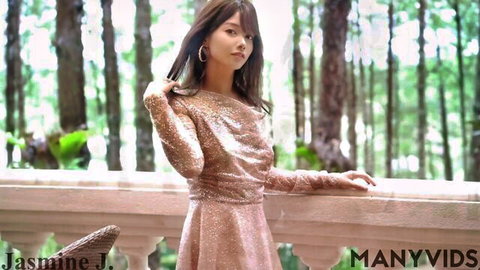 JasmineJ9966 in sparkling pink dress posing outdoors seductively