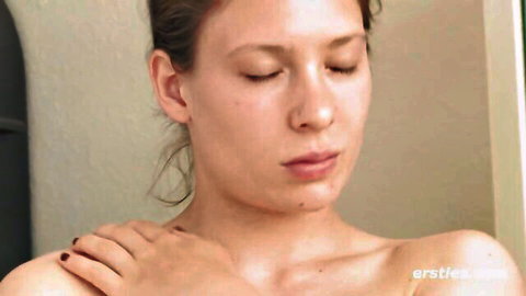 Helena topless, caressing her neck seductively in curvy teen solo tease