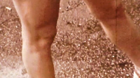 Vintage busty blonde bombshell soaking wet thighs close-up