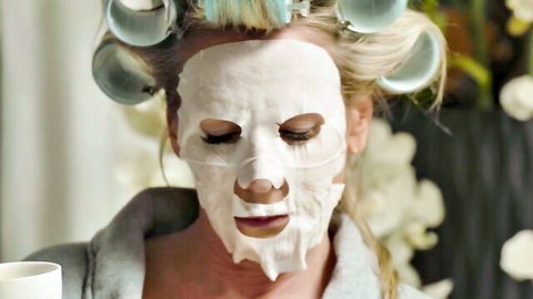 Mature blonde cougar in curlers and face mask from French porn seduction scene