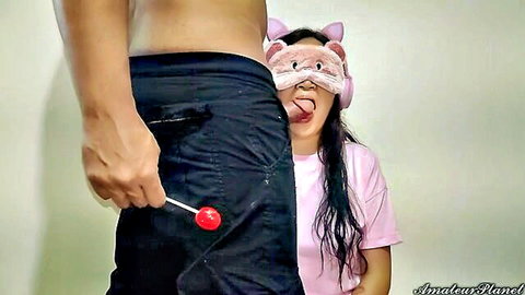 Depraved step-uncle teases naive step-niece with lollipop near crotch in amateur incest video