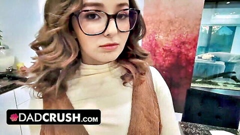 Busty MILF Kenzie Love in glasses and vest, seductive gaze