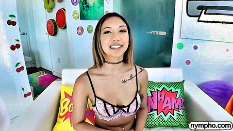 Kimora Quin in pink lace bra and choker, seductive smile