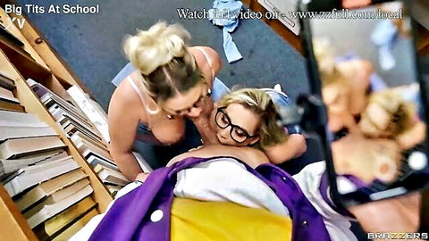 Busty blondes Jenna Starr and Blake Blossom topless lesbian embrace