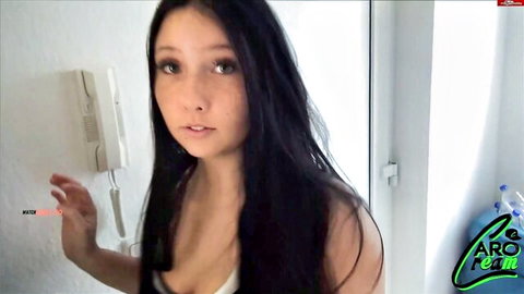 CaroCream teases with cleavage in low-cut top on phone call
