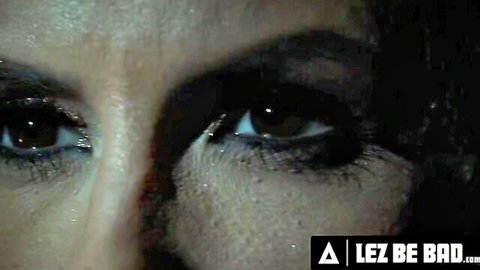 Penny Barber's intense smoky eyes in lesbian domination BDSM scene
