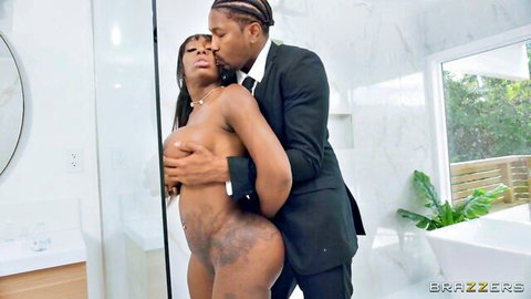 Ebony Mystique naked in rough doggy style embrace with suited man in shower