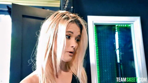 Blonde Sophia Sterling with shocked expression in black top, teasing anal threesome