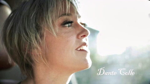 Dee Williams profile in sunny car, short blonde hair