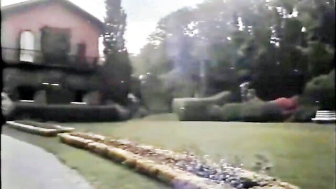 Outdoor garden scene with pink house, setting for naughty Swedish aunt's wild adventure