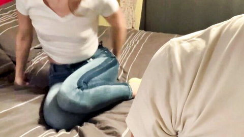 Damien Soft and girlfriend in tight jeans and tank top on bed, intimate couple moment