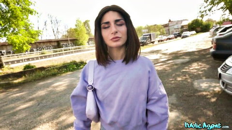 Lola Danger in casual purple sweatshirt outdoors, teasing Italian booty vibe