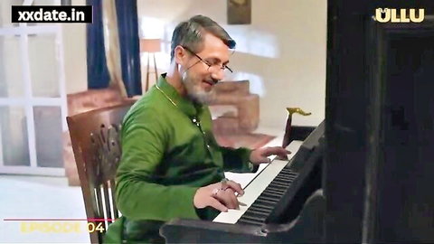 Indian mature man in green kurta playing piano in desi erotic scene