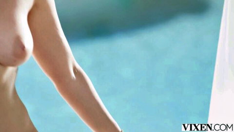 Eve Sweet topless by pool, perky small breasts exposed in tease
