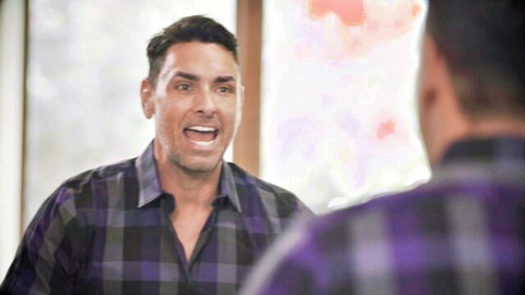 Melody Marks in intense scene with handsome man in plaid shirt