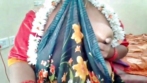 South Asian MILF in saree exposes huge tits and pinches erect nipple