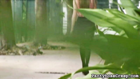 Alice March's tight ass in black pantyhose, outdoor tease