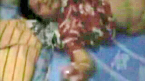 Indian babe in colorful dress strokes hard cock with hands POV