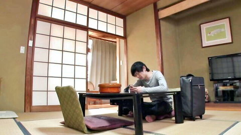 Kurea Hasumi's JAV setup: young man in traditional Japanese room with suitcase, buxom VR tease