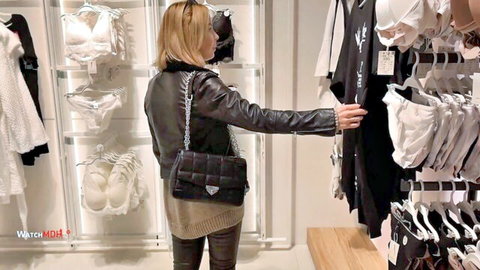 Blonde BarbaraXO shopping for sexy lingerie in leather jacket and tight pants