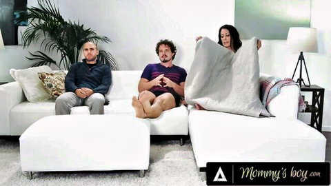 Reagan Foxx sneaks handjob to stepson on couch with oblivious husband