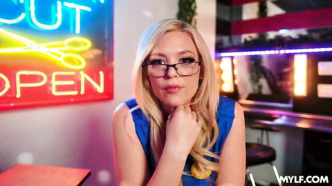 Busty blonde Barbie Beach in glasses seduces in salon, big tits tease