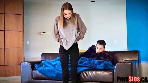Danni Rivers teases stepbro on couch in gray sweater and black pants