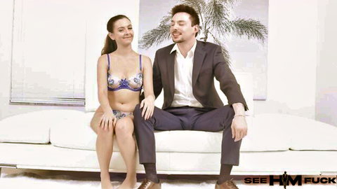 Serena Hill in blue lace lingerie with suited man on couch