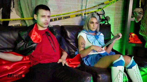 Gabbie Carter in sexy Alice costume with vampire at naughty Halloween party