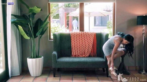 Lulu Chu bends over in short dress, slipping on sexy high heels