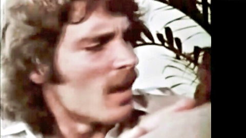 Vintage shaggy-haired man with mustache moaning intensely close-up during sex
